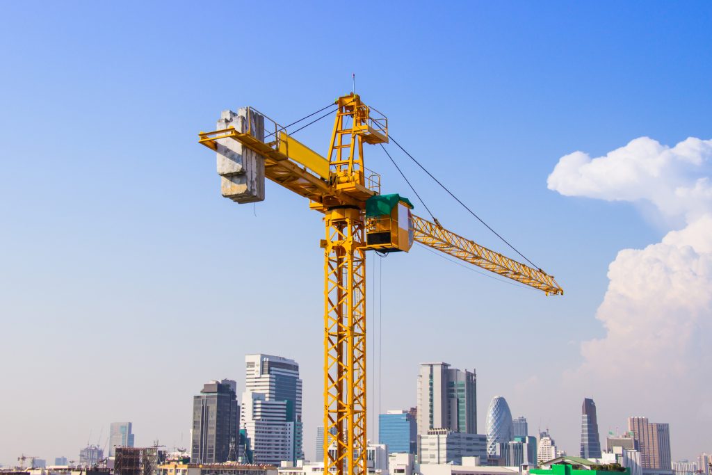 Crane is used in the construction of high buildings for tool of